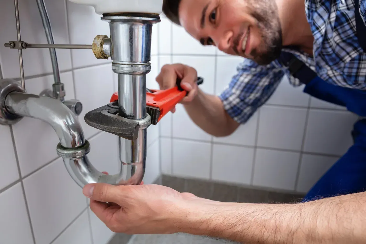Débouchage d'un siphon sous évier à Stains